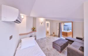 Postel nebo postele na pokoji v ubytování Hera Hotel