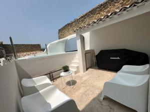 Posezení v ubytování Les Romarins - 5 chambres