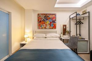 Postel nebo postele na pokoji v ubytování Alpina Regal Hotel