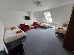 Postel nebo postele na pokoji v ubytování Hotel Restaurant Na Statku