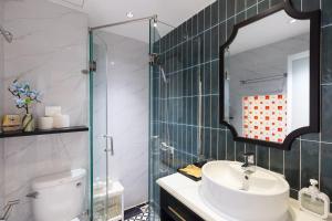 Koupelna v ubytování Alpina Regal Hotel