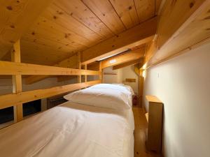 Katil atau katil-katil dalam bilik di A Casa di Ida, Rifugio Rustico Stile Chalet in Cilento
