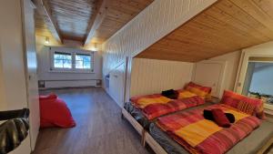 Postel nebo postele na pokoji v ubytování Zum Lerch Penthouse