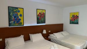 A bed or beds in a room at Hotel Sant March