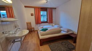 Postel nebo postele na pokoji v ubytování Apartment Etzel