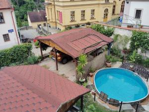 an overhead view of a building with a swimming pool at Privat Anna in Loket