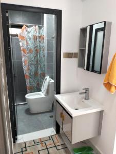 Ένα μπάνιο στο Smart homes Apartments