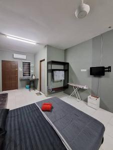 Ένα ή περισσότερα κρεβάτια σε δωμάτιο στο ROOMSTAY BIENA SANA