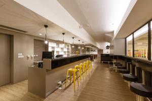 Ein Restaurant oder anderes Speiselokal in der Unterkunft Hotel Delfin Plava Laguna 