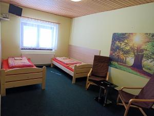 Postel nebo postele na pokoji v ubytování Pavilon v ráji