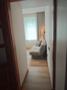 Postel nebo postele na pokoji v ubytování Kambarių nuoma ant marių kranto