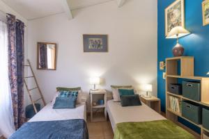Postel nebo postele na pokoji v ubytování Gite Provençal