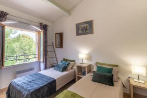 Postel nebo postele na pokoji v ubytování Gite Provençal + 25 fotografií