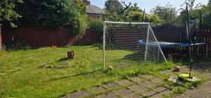 a soccer goal in the yard of a house at Family house in Lemington
