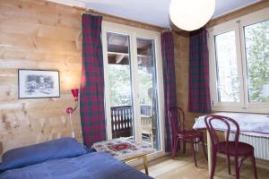 Postel nebo postele na pokoji v ubytování Chalet Cresta di Saas