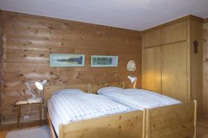 Postel nebo postele na pokoji v ubytování Chalet Cresta di Saas