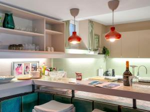 Kuchnia lub aneks kuchenny w obiekcie Gemütliche Ferienwohnung mit Terrasse und Seeblick