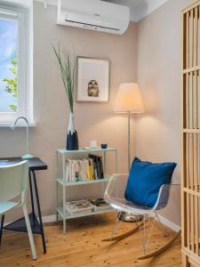 Część wypoczynkowa w obiekcie Gemütliche Ferienwohnung mit Terrasse und Seeblick