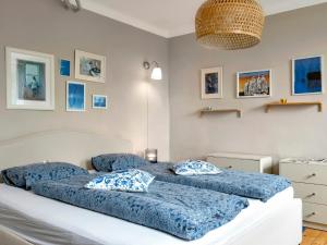 Łóżko lub łóżka w pokoju w obiekcie Gemütliche Ferienwohnung mit Terrasse und Seeblick