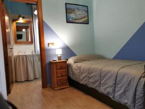 Postel nebo postele na pokoji v ubytování La Cerca