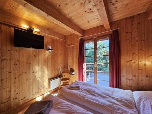 Postel nebo postele na pokoji v ubytování Chalet Flair