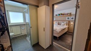 Postel nebo postele na pokoji v ubytování Haus VALLESIA
