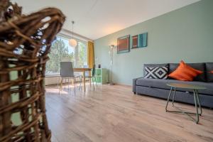 Posezení v ubytování Viktoria A12 by Arosa Vacations, Renoviertes App mit Bergblick im Zentrum