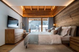 Postel nebo postele na pokoji v ubytování Berghof Penthouse