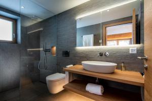 Koupelna v ubytování Berghof Penthouse + 18 fotografií
