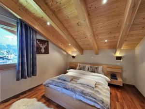 Postel nebo postele na pokoji v ubytování Aramis Penthouse