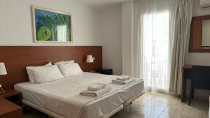 A bed or beds in a room at Hotel Sant March