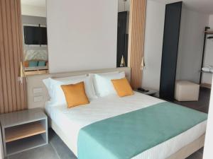 Posteľ alebo postele v izbe v ubytovaní HOTEL ASTOR