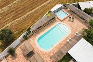 Bazén v ubytování Gandum Village - Conscious Boutique Hotel nebo v jeho okolí + 37 fotografií