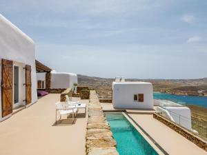 a villa with a swimming pool and a view at Villa Levi's in Mykonos