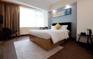 Voodi või voodid majutusasutuse The Imperial Hotel toas
