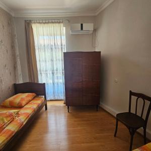 Postel nebo postele na pokoji v ubytování Rooms in old Tbilisi