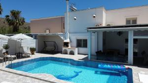 The swimming pool at or close to Villa Fantasia- Less than 5-Min Walk to Kalivaki Beach