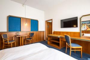 Μια τηλεόραση ή/και κέντρο ψυχαγωγίας στο Hotel und Rasthof AVUS