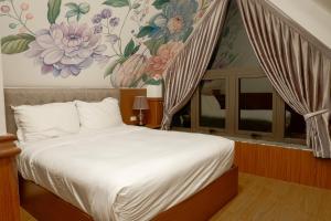 Postel nebo postele na pokoji v ubytování Faru Pine Woods Villa