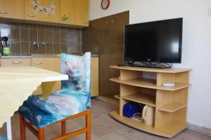 Kuchyň nebo kuchyňský kout v ubytování One Bedroom Apartment