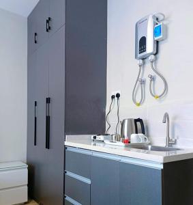 a kitchen with a sink and a counter top at Polar homes in Nairobi