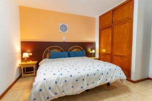 Ένα ή περισσότερα κρεβάτια σε δωμάτιο στο Apartamento Clemente en Cancajos