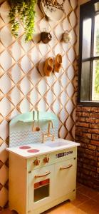 a kitchen with a sink and a counter top at Retraitre bij de brug in Zuidveld +125 photos