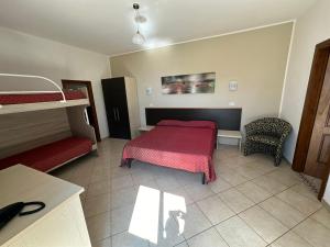 Postel nebo postele na pokoji v ubytování Hotel Normanni