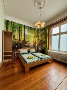 Postel nebo postele na pokoji v ubytování Gästezimmer am Hansaplatz