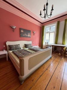 Postel nebo postele na pokoji v ubytování Gästezimmer am Hansaplatz