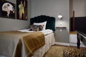 Postel nebo postele na pokoji v ubytování Boutique Hotel Yöpuu