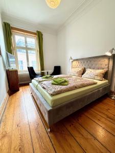 Postel nebo postele na pokoji v ubytování Gästezimmer am Hansaplatz