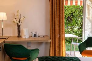 Posezení v ubytování Hôtel & Résidence Lou Paradou Gréoux Les Bains