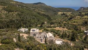 an aerial view of a house on a hill at Comodo Studios in Kythira